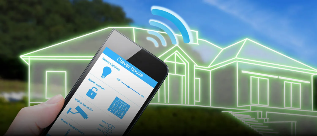 A hand holds a smartphone displaying a smart home control app, with an illustrated outline of a house in the background and blue wireless signal lines connecting the phone to the house, showcasing the possibilities of a wireless world with smart sensing technology. by Standex Detect