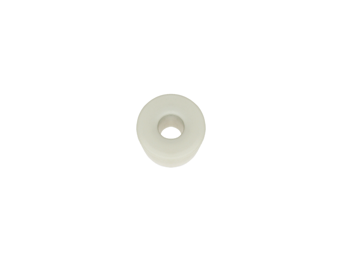 A small, white, round plastic washer from the MS02-PP Series, featuring a central hole, is shown against a plain white background. by Standex Detect