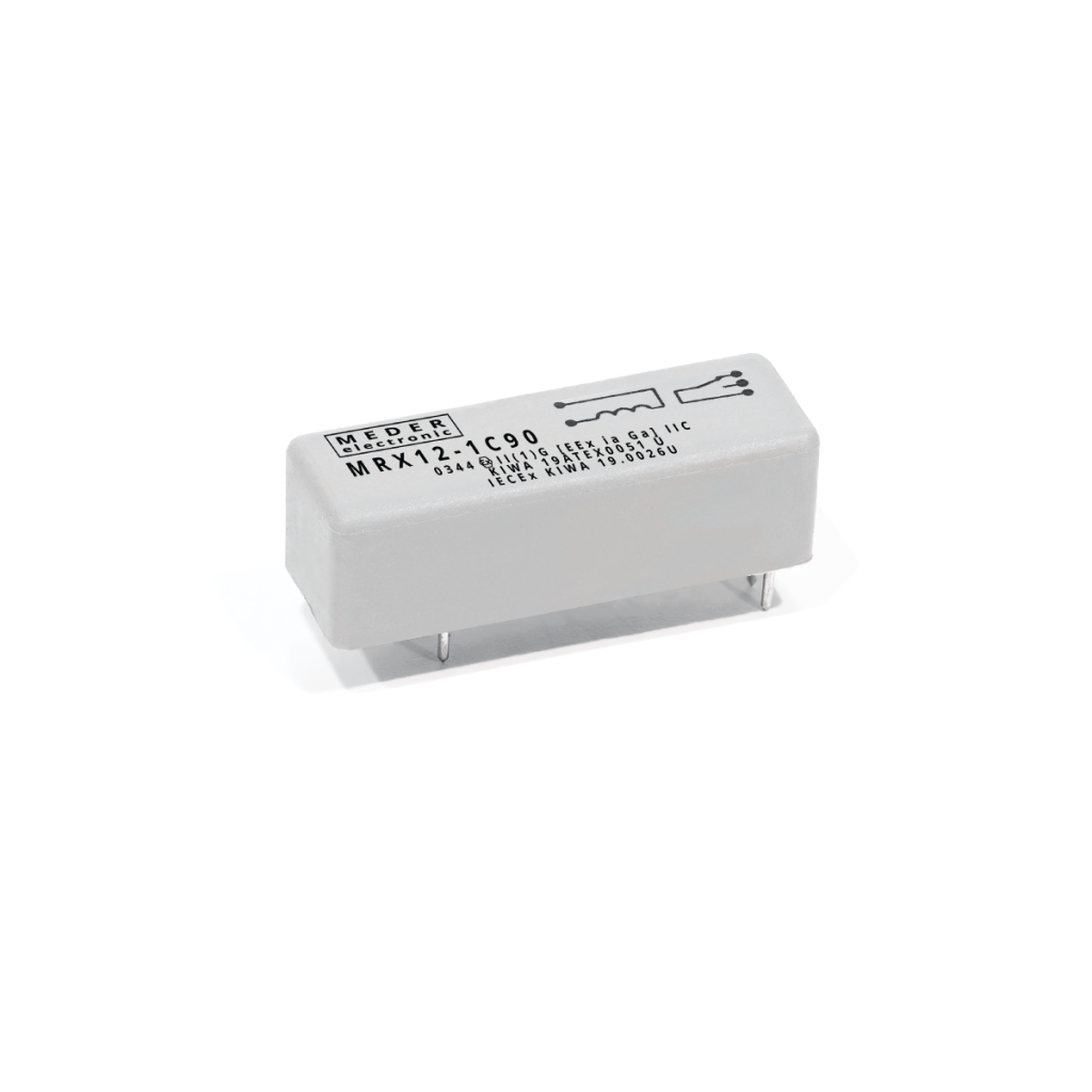 A rectangular silver Reed Relay electronic component with four pins on the bottom and black printed text and symbols on the top side, isolated on a white background. by Standex Detect