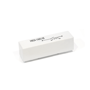 A white rectangular HM Series Reed Relay labeled HM24-1A83-08 with a circuit diagram printed on top is shown on a plain white background. by Standex Detect