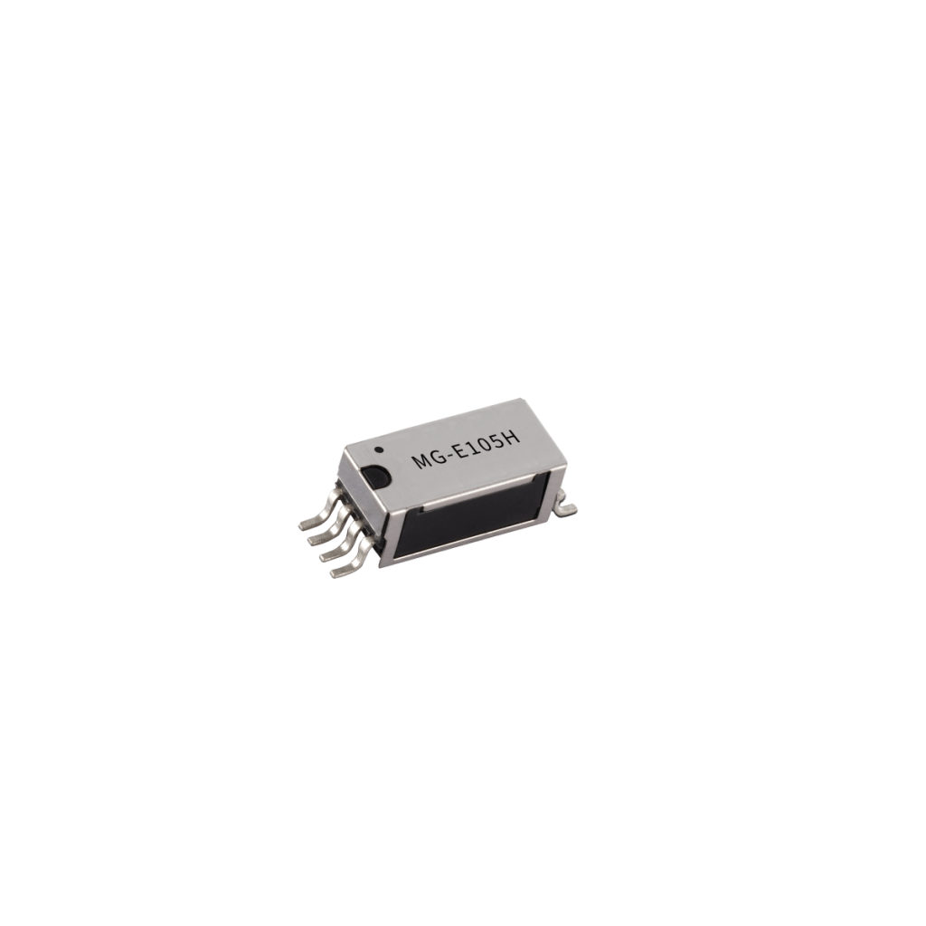 A small M Series electronic component with four metal pins on each side and MG-E105H labeled on the top, this Reed Relay is isolated on a white background. by Standex Detect