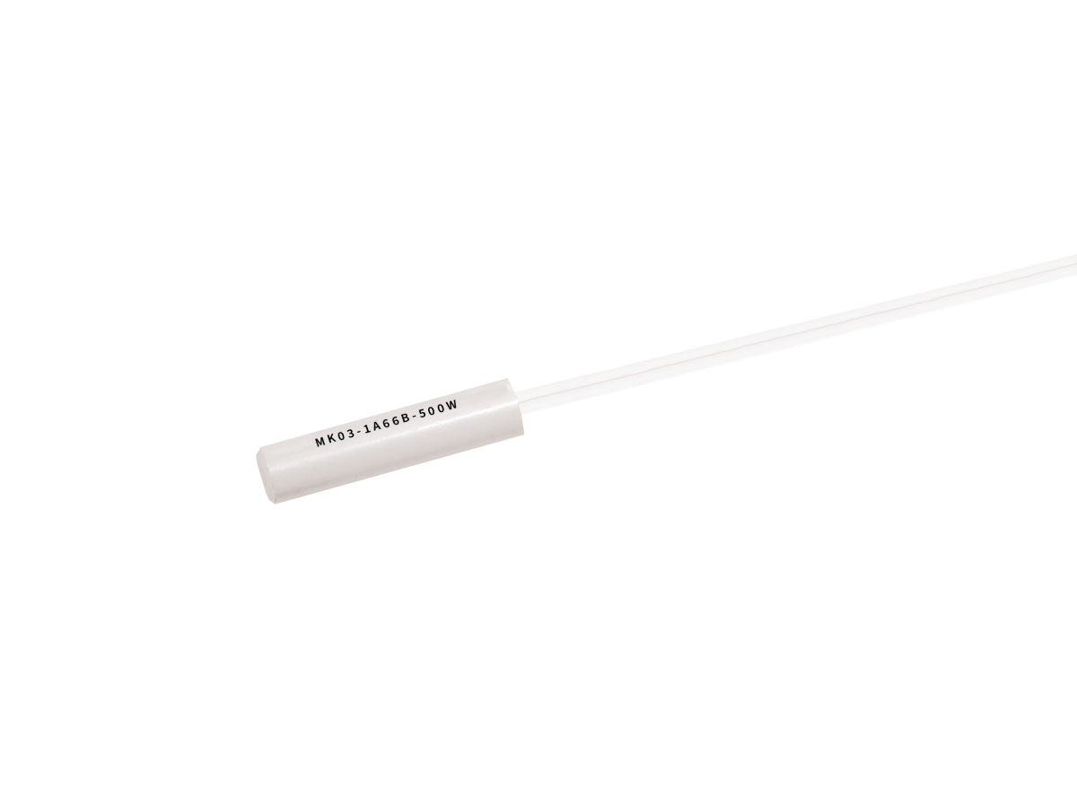A white cylindrical Reed sensor from the MK03 series with a long, thin wire extending from one end. The cylinder is labeled MK03-1A66B-500W in black text. The background is plain white. by Standex Detect