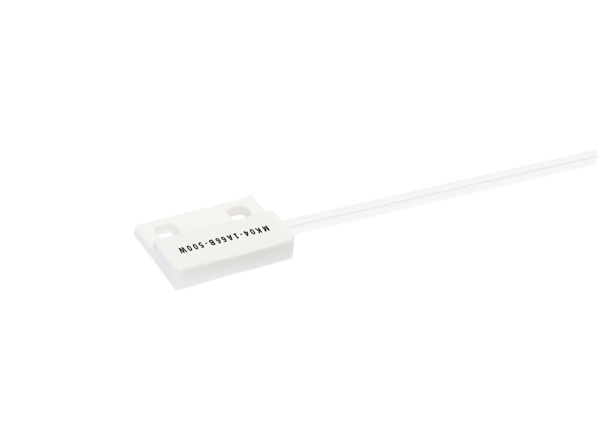 A small white rectangular MK04 Series Reed Sensor with two mounting holes and an attached white wire extending from one side. The sensor is labeled “M05-0501V1-10WH.” The background is plain white. by Standex Detect