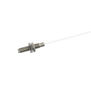 A metallic MK11 Reed Sensor with threaded cylindrical body and hex nut, attached to a thin, transparent cable, is showcased on a white background. by Standex Detect