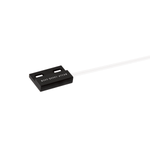 A small rectangular black MK21 Series Reed Sensor with two holes and white printed text, attached to a white cable, shown on a white background. by Standex Detect