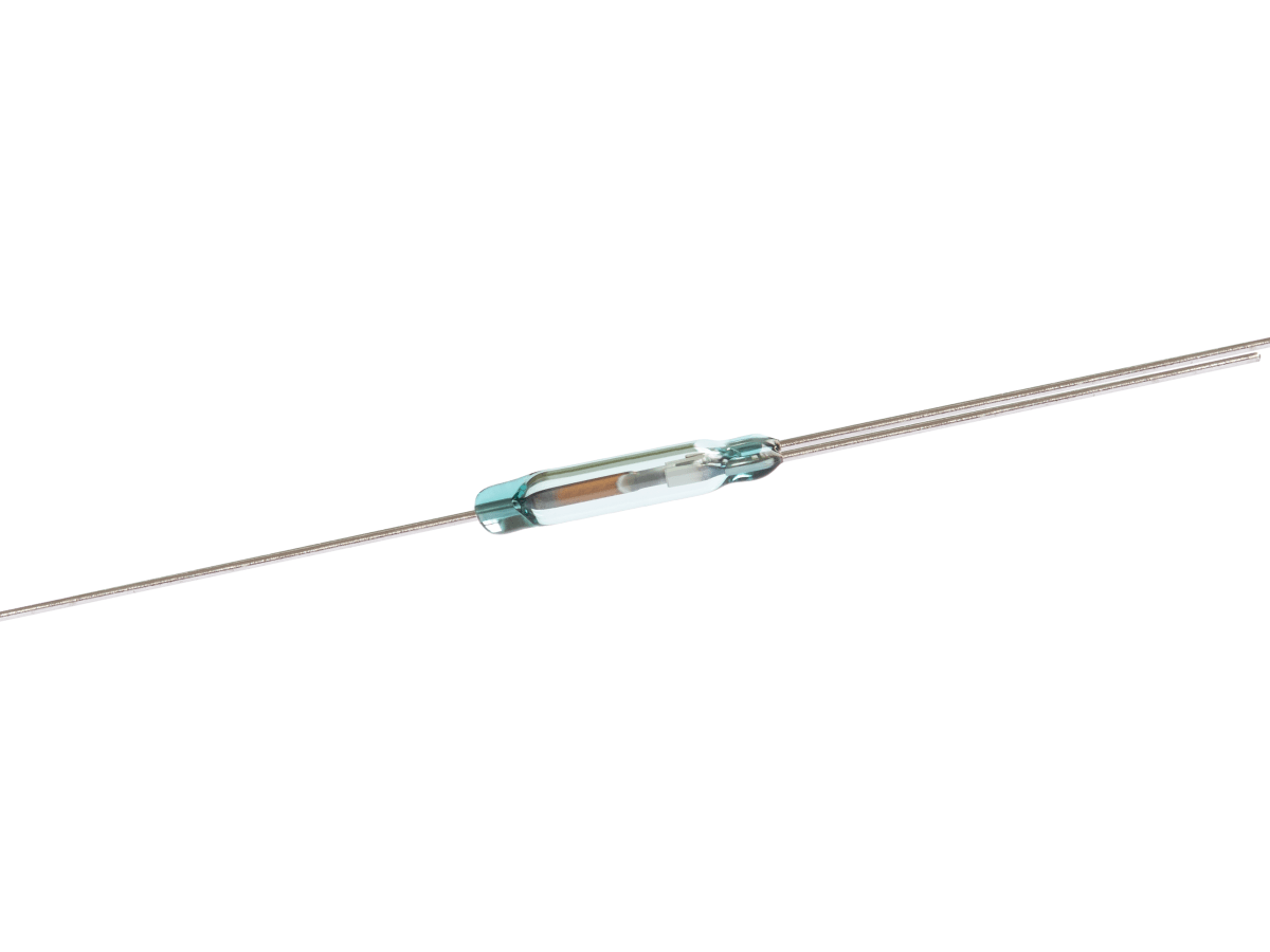 A small cylindrical glass ORT651 Series reed switch with two long metal leads extending from both ends, shown on a white background. by Standex Detect
