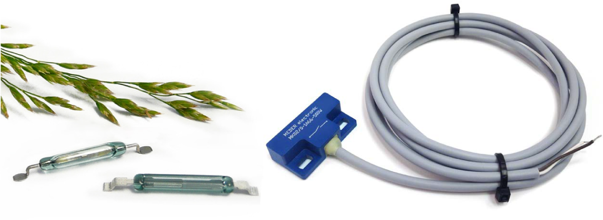 Two glass reed switches lie next to green plant stems (left), suggesting agricultural applications, while a blue Hall sensor with a long grey cable is coiled neatly beside it on the right, both set against a clean white background. by Standex Detect